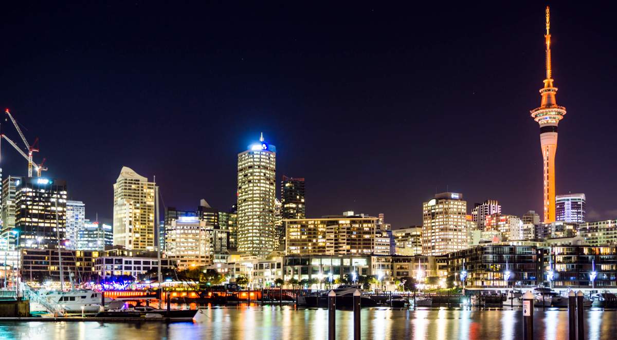 Auckland skykibe by night: Sky Tower is coloured orange, all other building have their normal yellow-ish colour due to lights