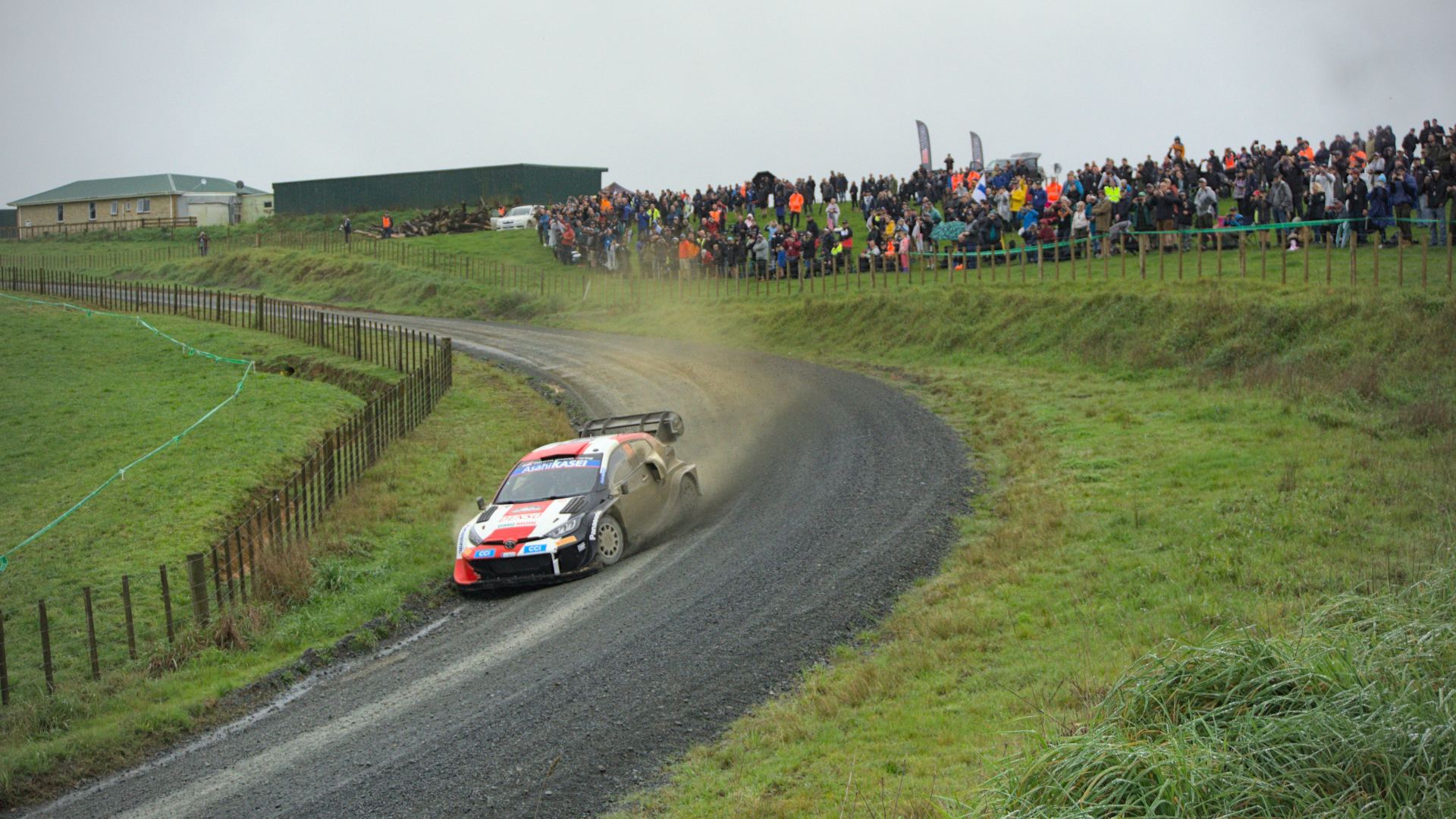 Muddy car in corner @ WRC Rally of New Zealand